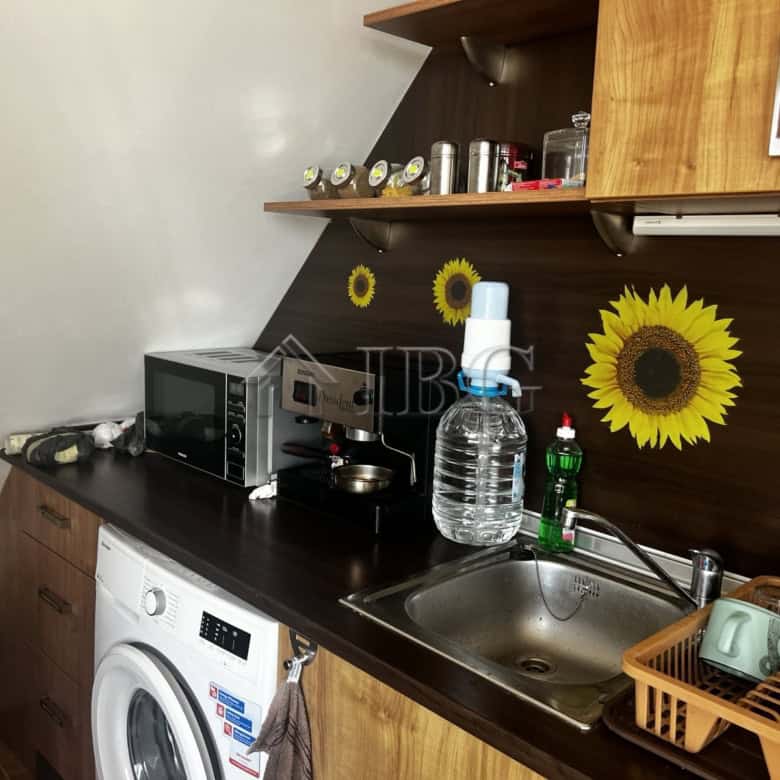 Interior of a small kitchen in a 1-bedroom apartment with sea view in Ravda, Bulgaria.