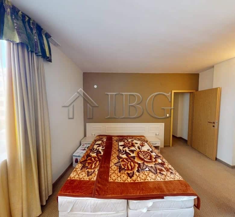Spacious bedroom with large window and natural light in Avalon complex, Sunny Beach.