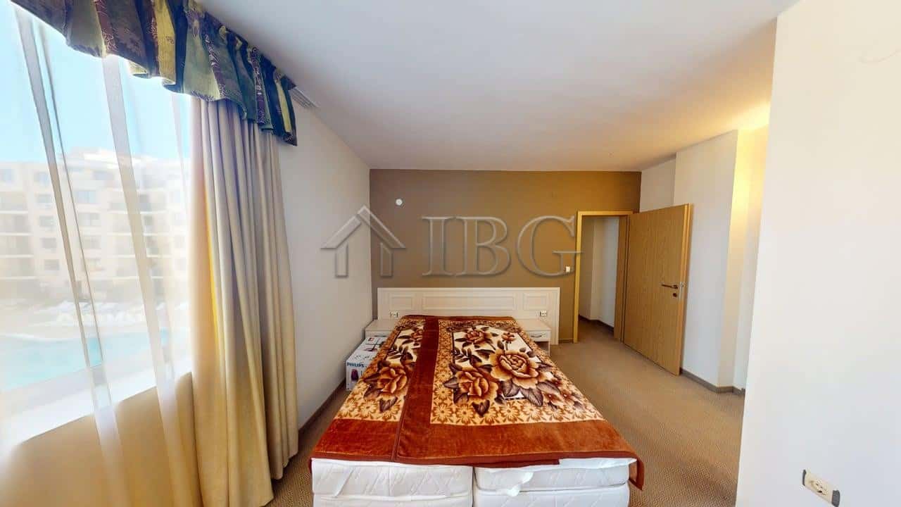Spacious bedroom with large window and natural light in Avalon complex, Sunny Beach.