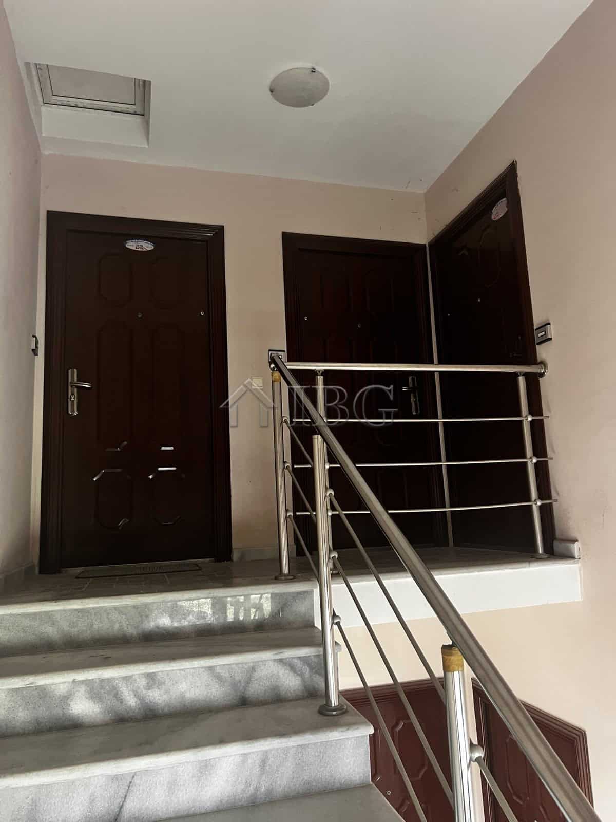 Interior view of a modern apartment with staircase and doors in Ravda, Bulgaria.