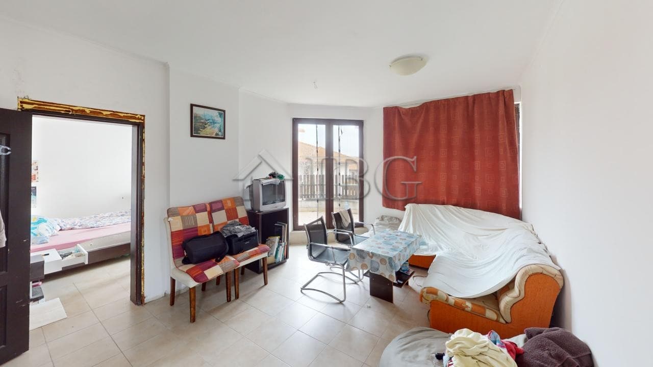 Bright 2-bedroom apartment in Bay View Villas, Kosharitsa, with living area and balcony views.