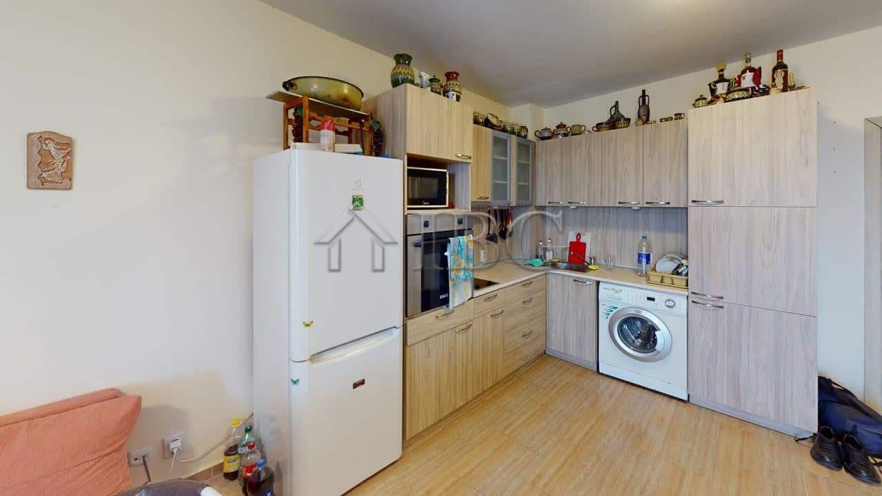 Modern kitchen with appliances in Kosharitsa apartment near Rio complex.
