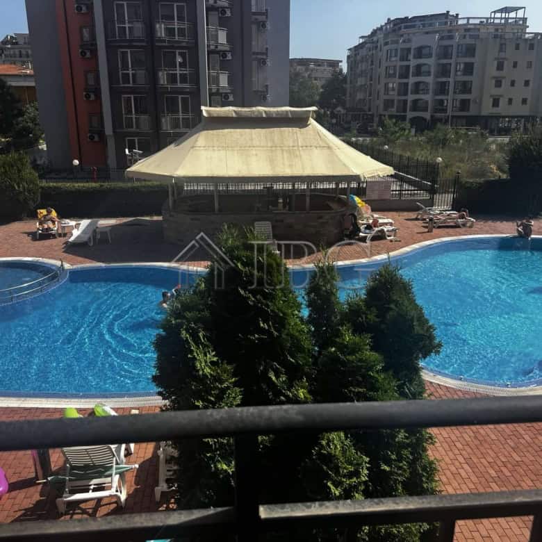 Pool view of a 2-bedroom apartment in Sunset Beach 3, Sunny Beach.