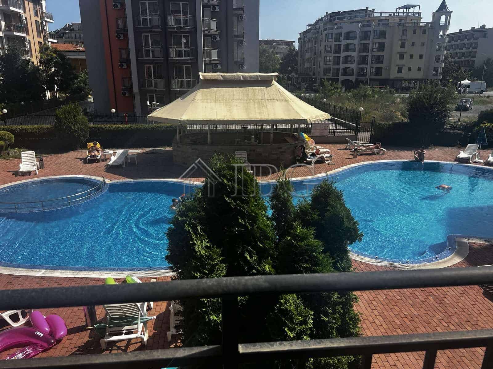 Pool view of a 2-bedroom apartment in Sunset Beach 3, Sunny Beach.