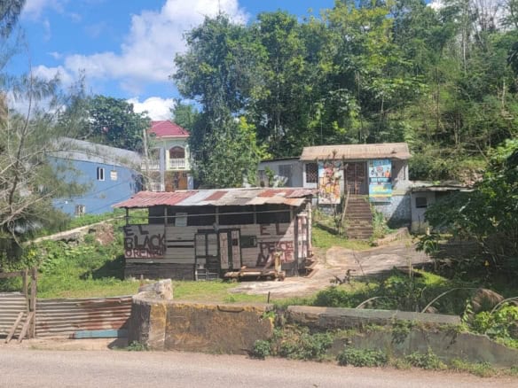 Land for sale in Grey Ground, Manchester, Jamaica, ideal for development or investment.