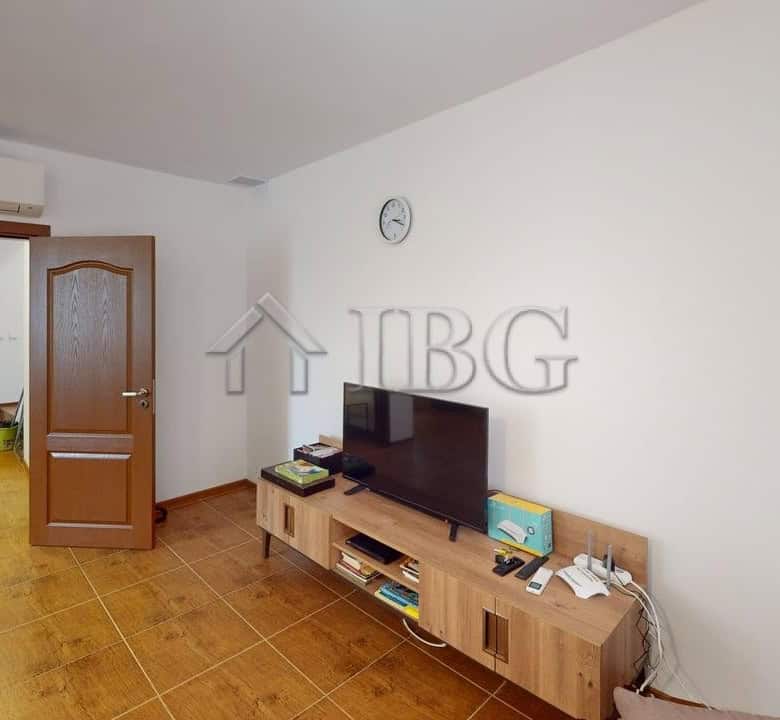 Bright living room with modern furniture in Bay View Villas, Kosharitsa.