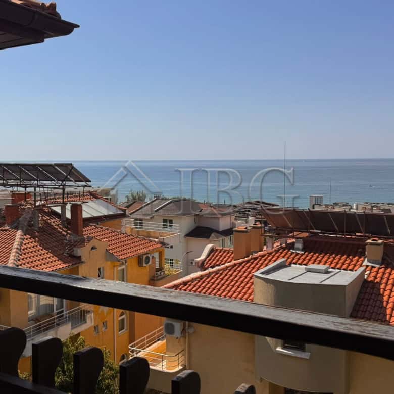 Balcony view of rooftops and sea in Sveti Vlas, Bulgaria.
