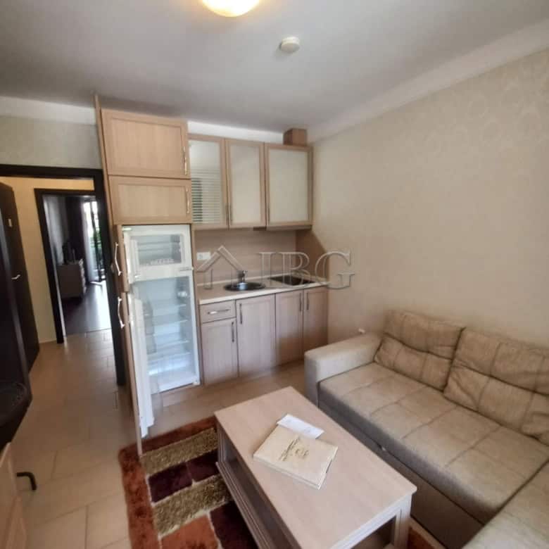 Apartment with pool view in Harmony Suites 1, Sunny Beach, featuring a compact kitchen and comfortab.