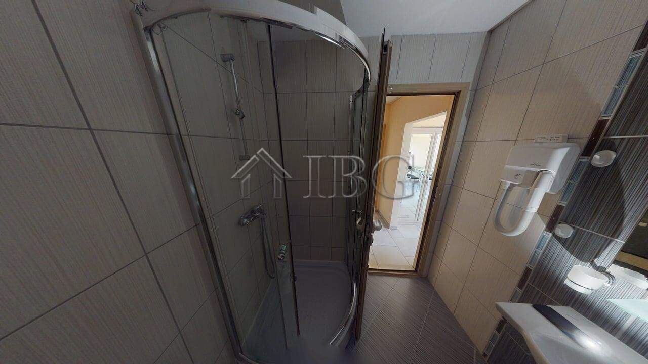 Bright bathroom with shower cabin in Avalon Complex, Sunny Beach.