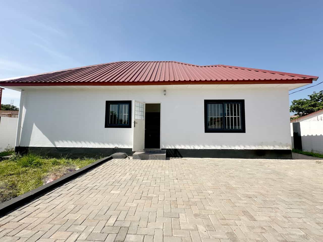 Modern 3-Bed Villa in Brufut Gardens, Gambia Modern 3-bed villa with white exterior and red roof in Brufut Gardens, Gambia, perfect for comfortab.