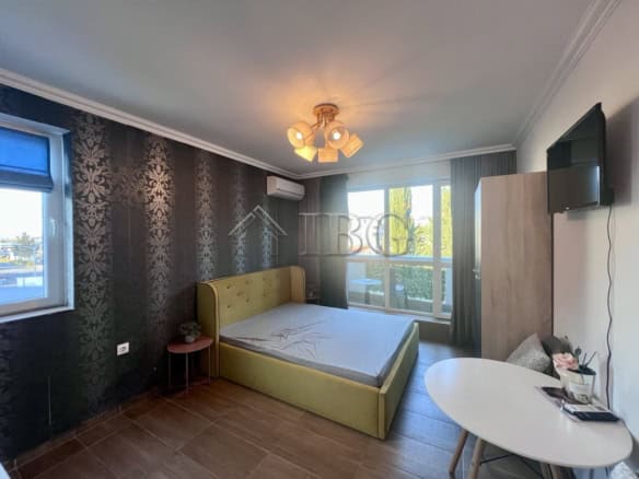 Furnished studio for sale at Magnolia Residence 5, Sunny Beach, featuring modern decor and a balcony.