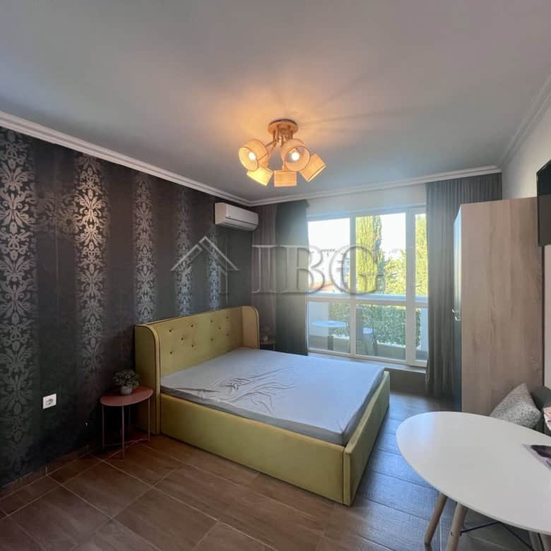 Furnished studio for sale at Magnolia Residence 5, Sunny Beach, featuring modern decor and a balcony.