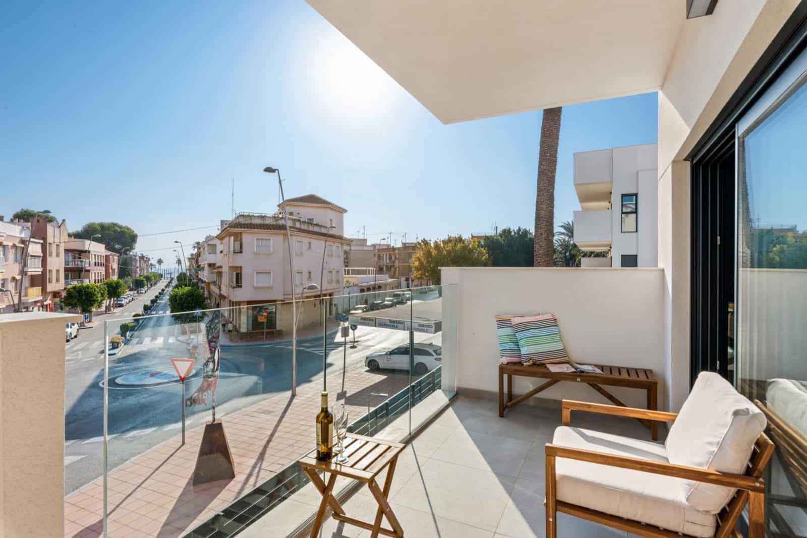 Bright 2-bedroom apartment with balcony views in Santiago De La Ribera, Murcia, Spain. Perfect for s.