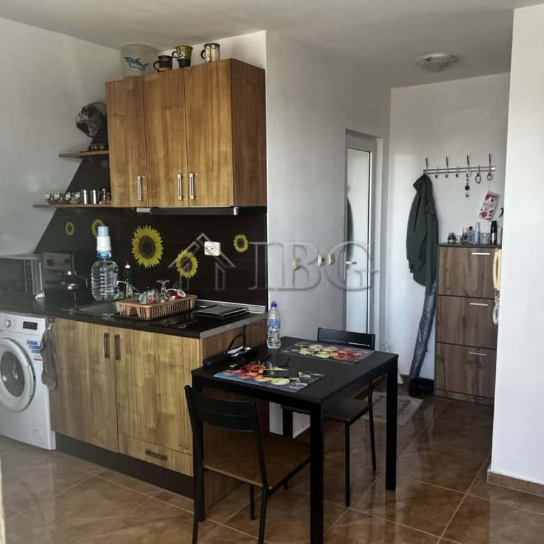 Bright 1-bedroom apartment with sea view in Ravda residential building.