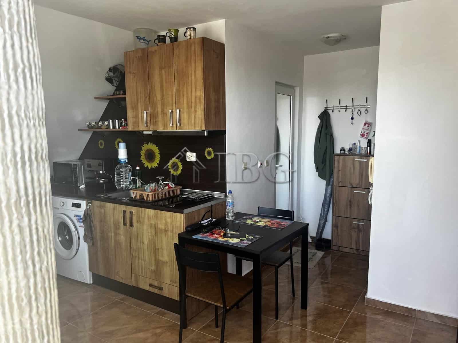 Bright 1-bedroom apartment with sea view in Ravda residential building.