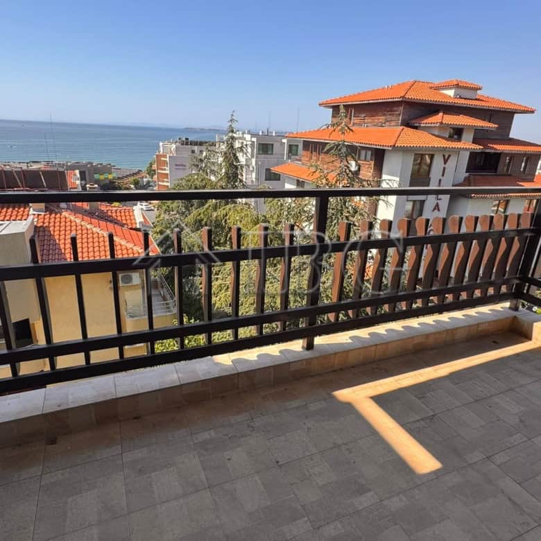 Balcony view of Sveti Vlas with sea and townscape in the background.
