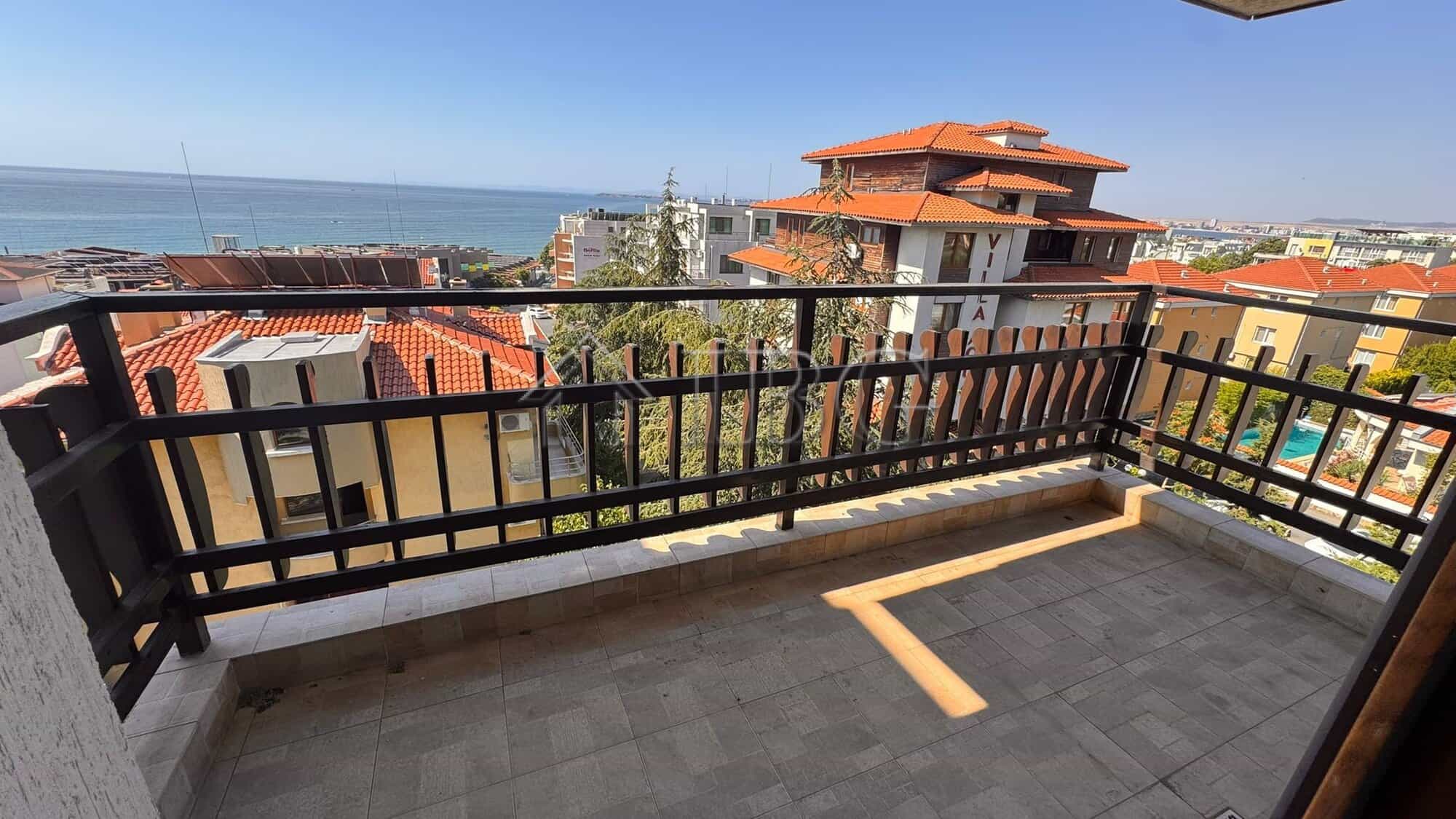 Balcony view of Sveti Vlas with sea and townscape in the background.