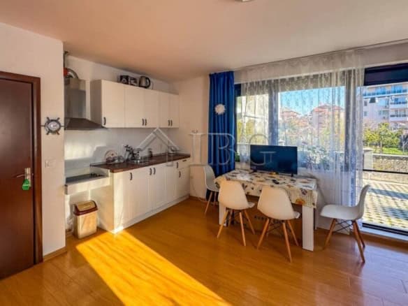 Bright studio apartment with private courtyard access in Sarafovo, Burgas. Modern interior with larg.