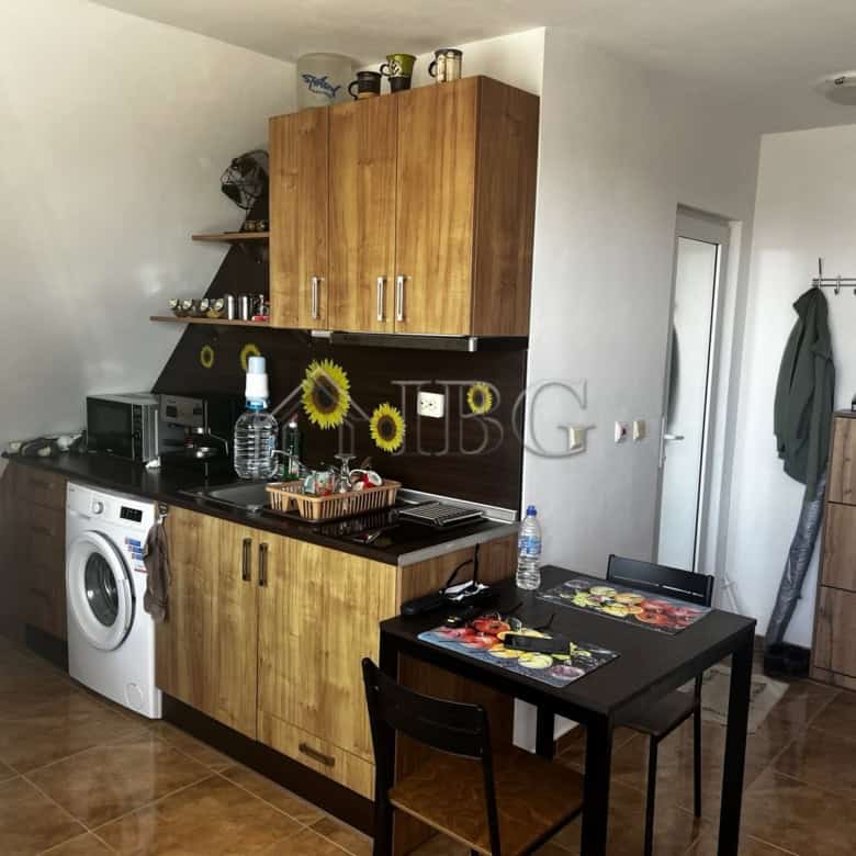 Bright 1-bedroom apartment with sea view in Ravda residential building.