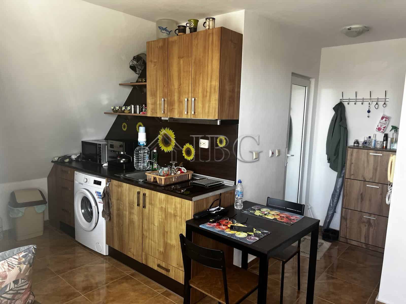 Bright 1-bedroom apartment with sea view in Ravda residential building.