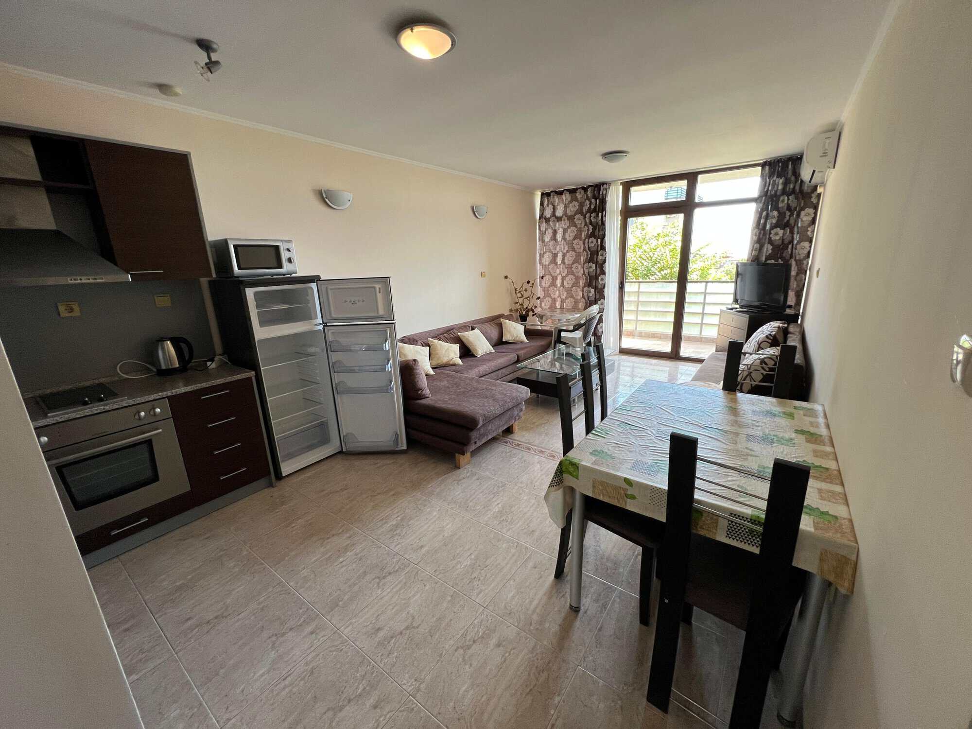 Apartment with partial sea view in Diamant Complex, Sveti Vlas, featuring a living area, kitchen, an.