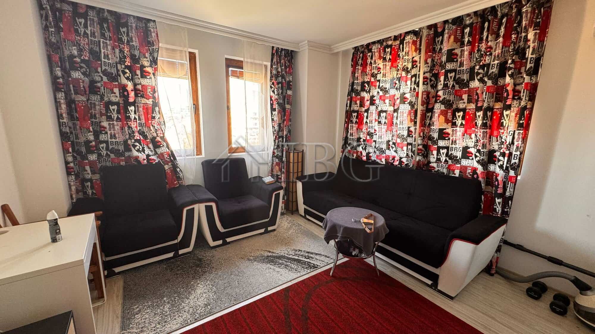 Bright living room with sea view in Sveti Vlas apartment.