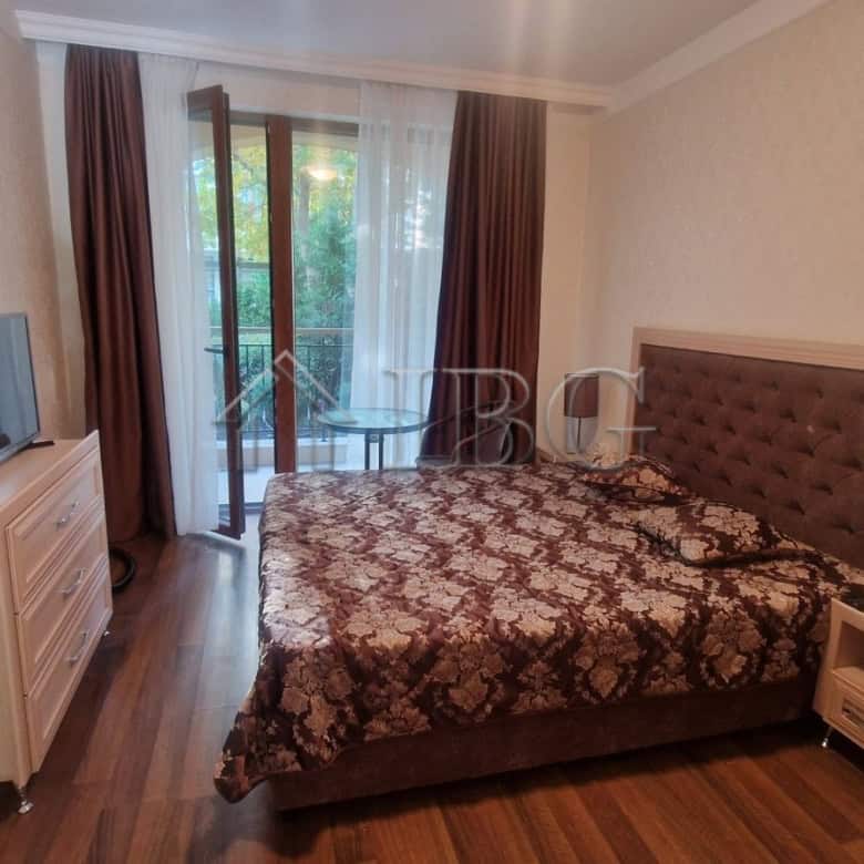 One-bedroom apartment with pool view in Harmony Suites 1, Sunny Beach, offering comfort and scenic s.