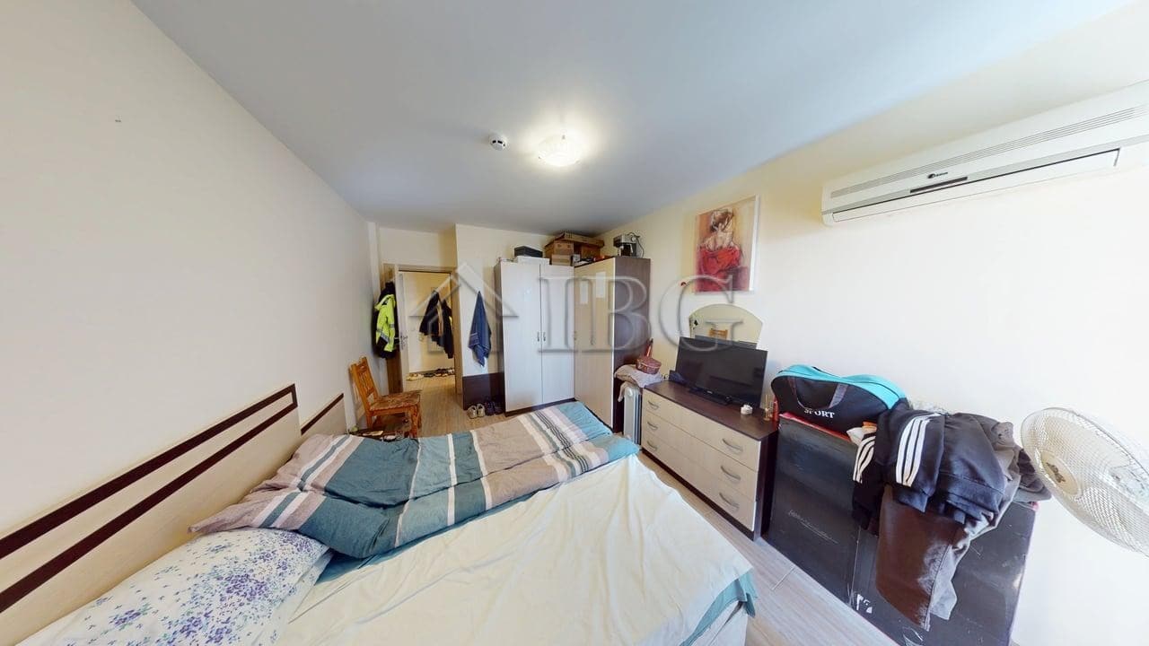 Interior view of a 1-bedroom apartment with a pool view in Kosharitsa.