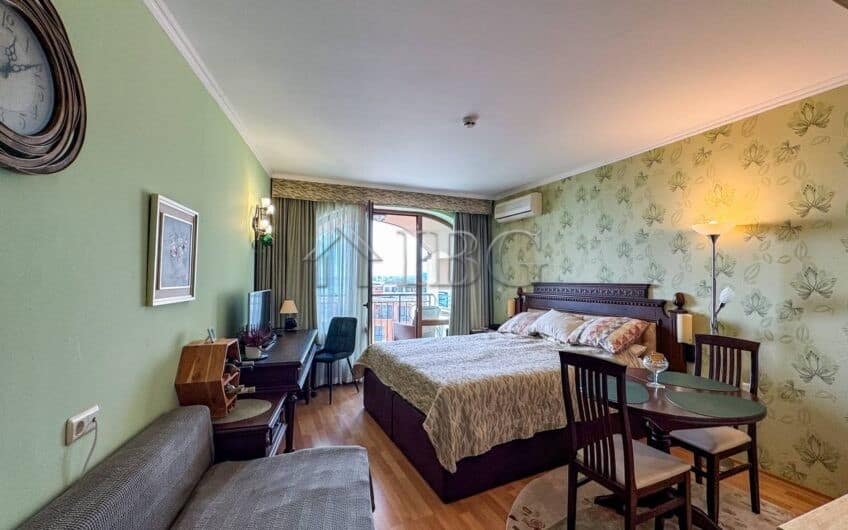 Beachfront studio apartment with sea views at Grand Hotel Sveti Vlas. Modern interior, cozy bedroom,.