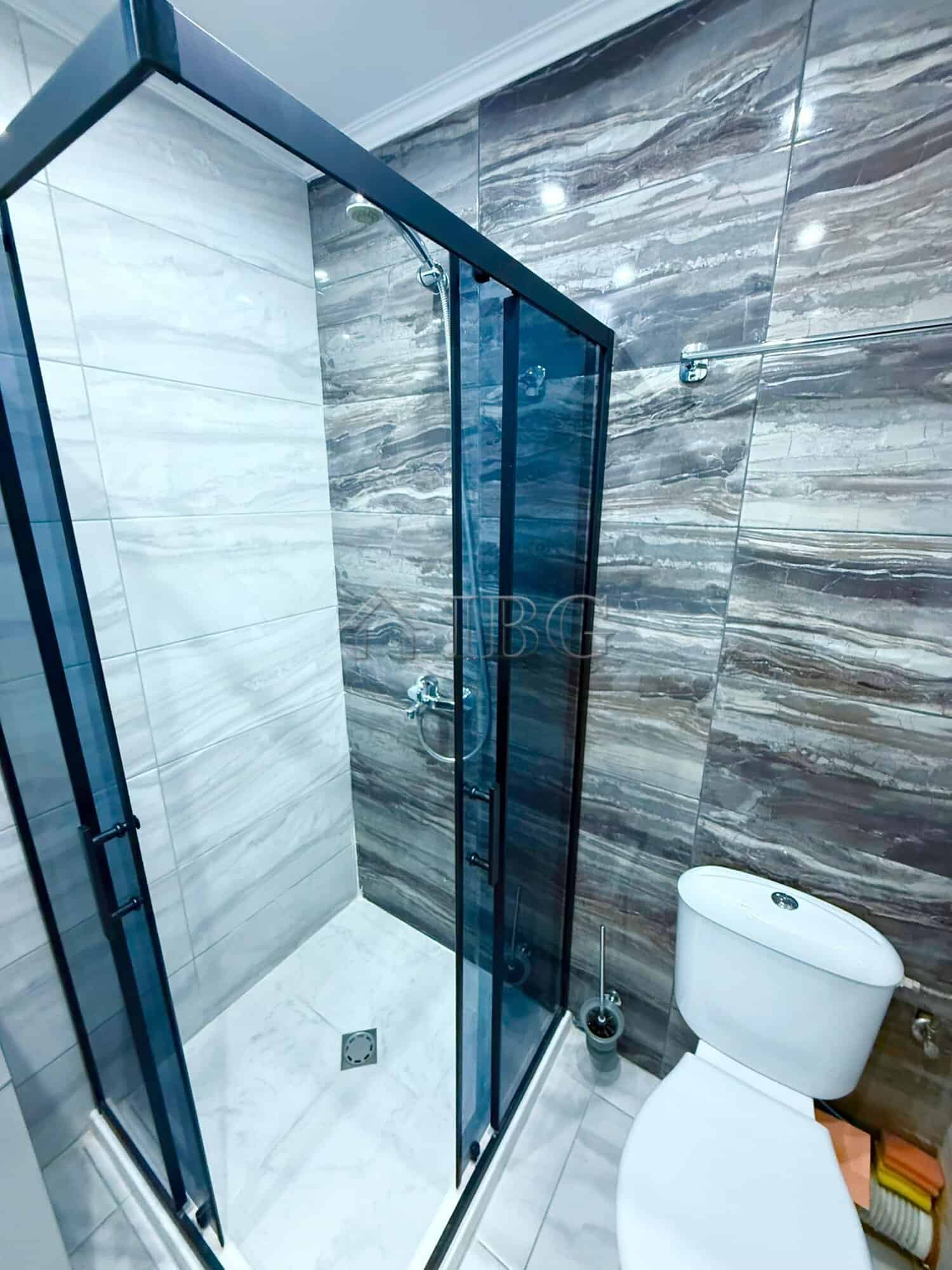 Bathroom with glass shower and contemporary design in Sveti Vlas, Bulgaria.