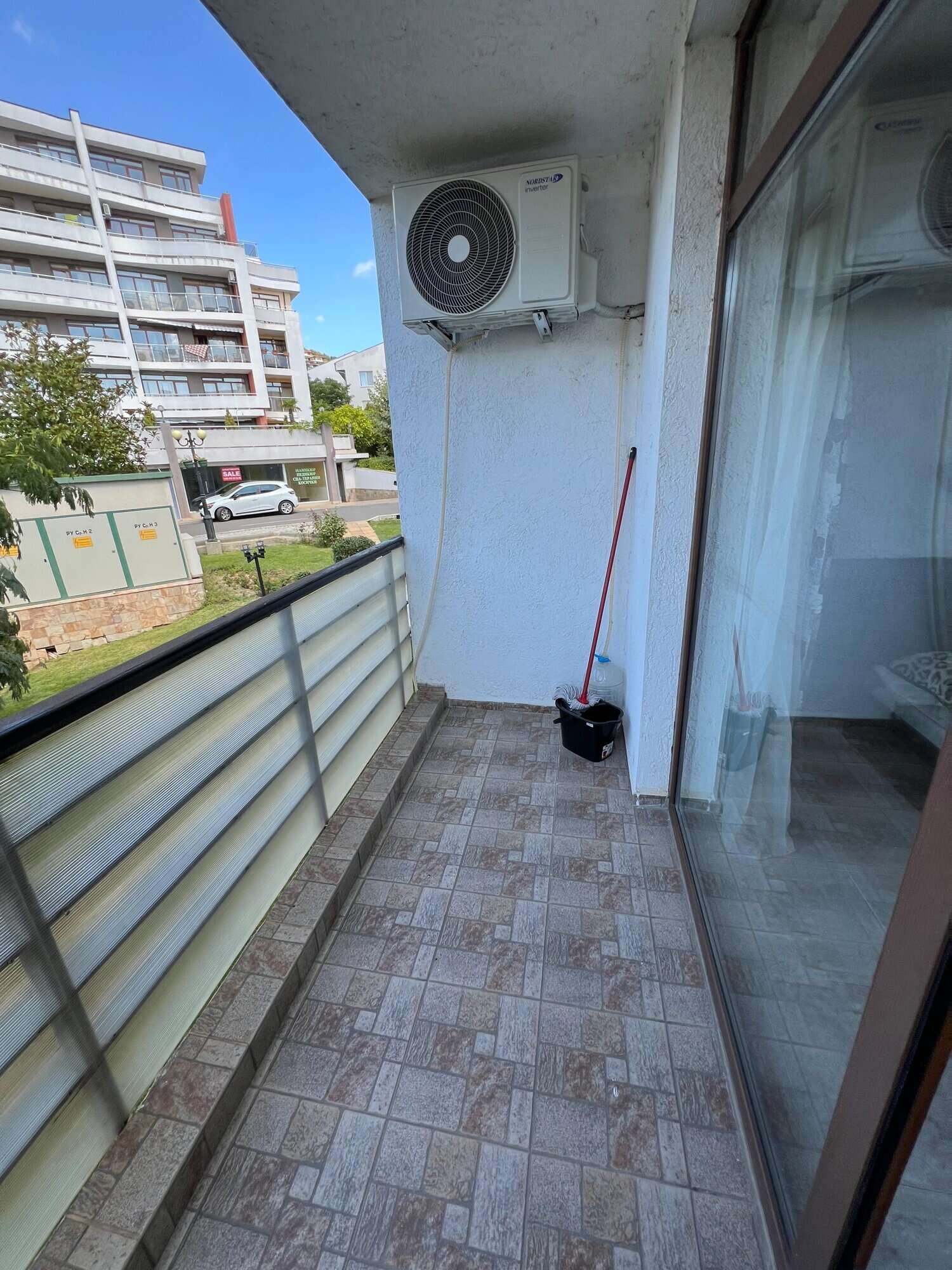 Balcony with air conditioning unit and partial sea view in Diamant Complex, Sveti Vlas.