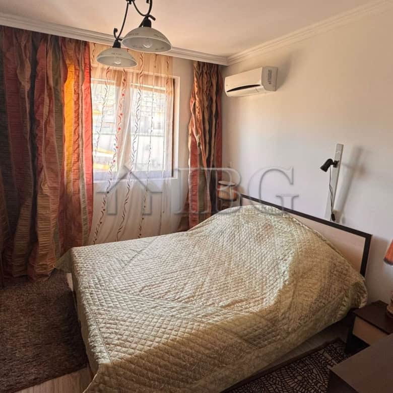 Sea view bedroom in Sveti Vlas with modern furnishings and natural light.