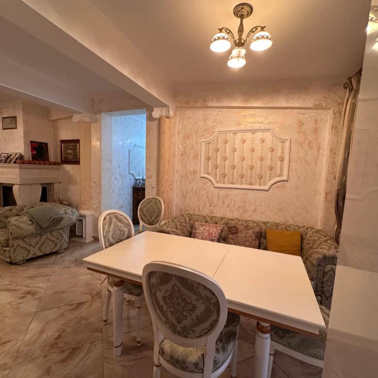 Bright living room with elegant furniture and cozy seating area in Venera Palace, Sunny Beach.