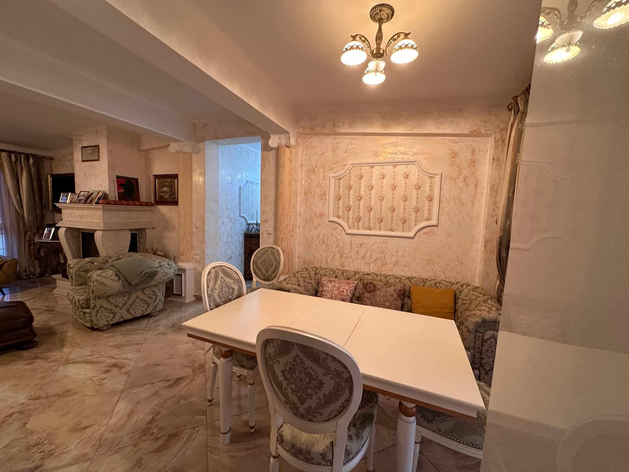 Bright living room with elegant furniture and cozy seating area in Venera Palace, Sunny Beach.