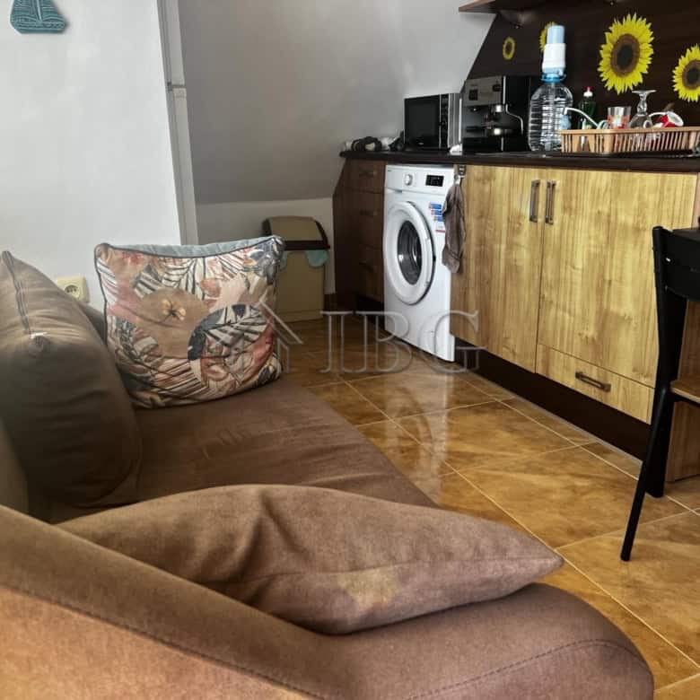 Bright apartment with sea view, modern kitchen, and comfortable living space in Ravda. Perfect for r.