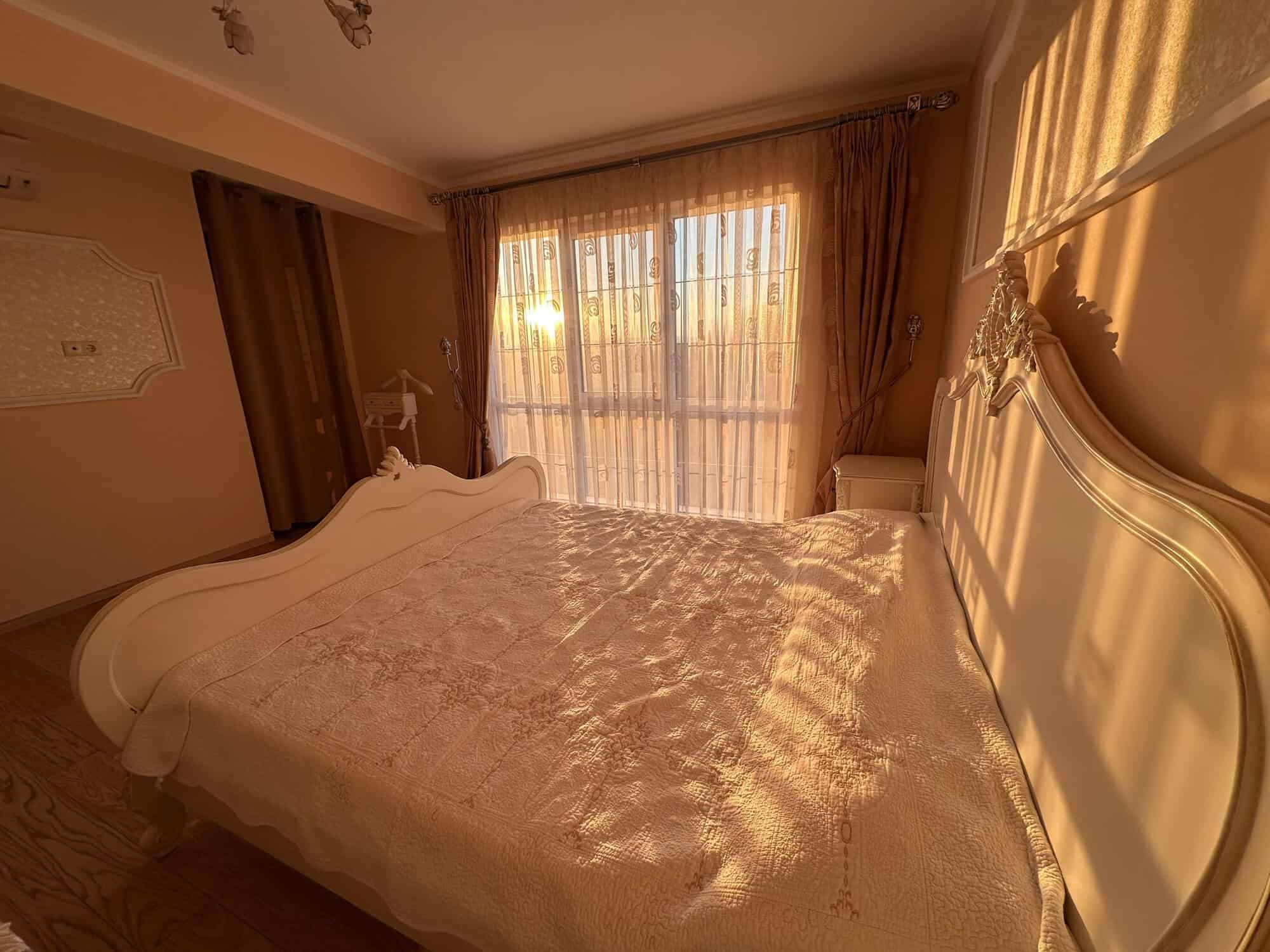 Bright, airy 2-bedroom apartment in Venera Palace with large windows and elegant decor.