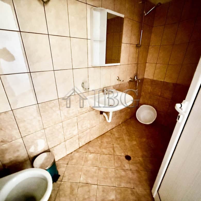 Small bathroom in a one-bedroom summer apartment in Ravda, south-facing.