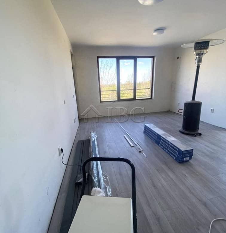 Bright 1-bedroom apartment with spacious living area, large window, and scenic views in Lighthouse G.