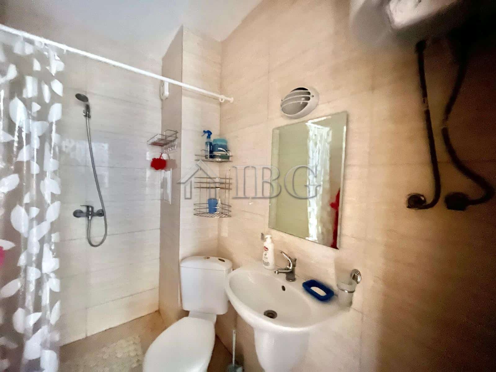 Bathroom with shower, sink, and mirror in Laguna 3, Sunny Beach.