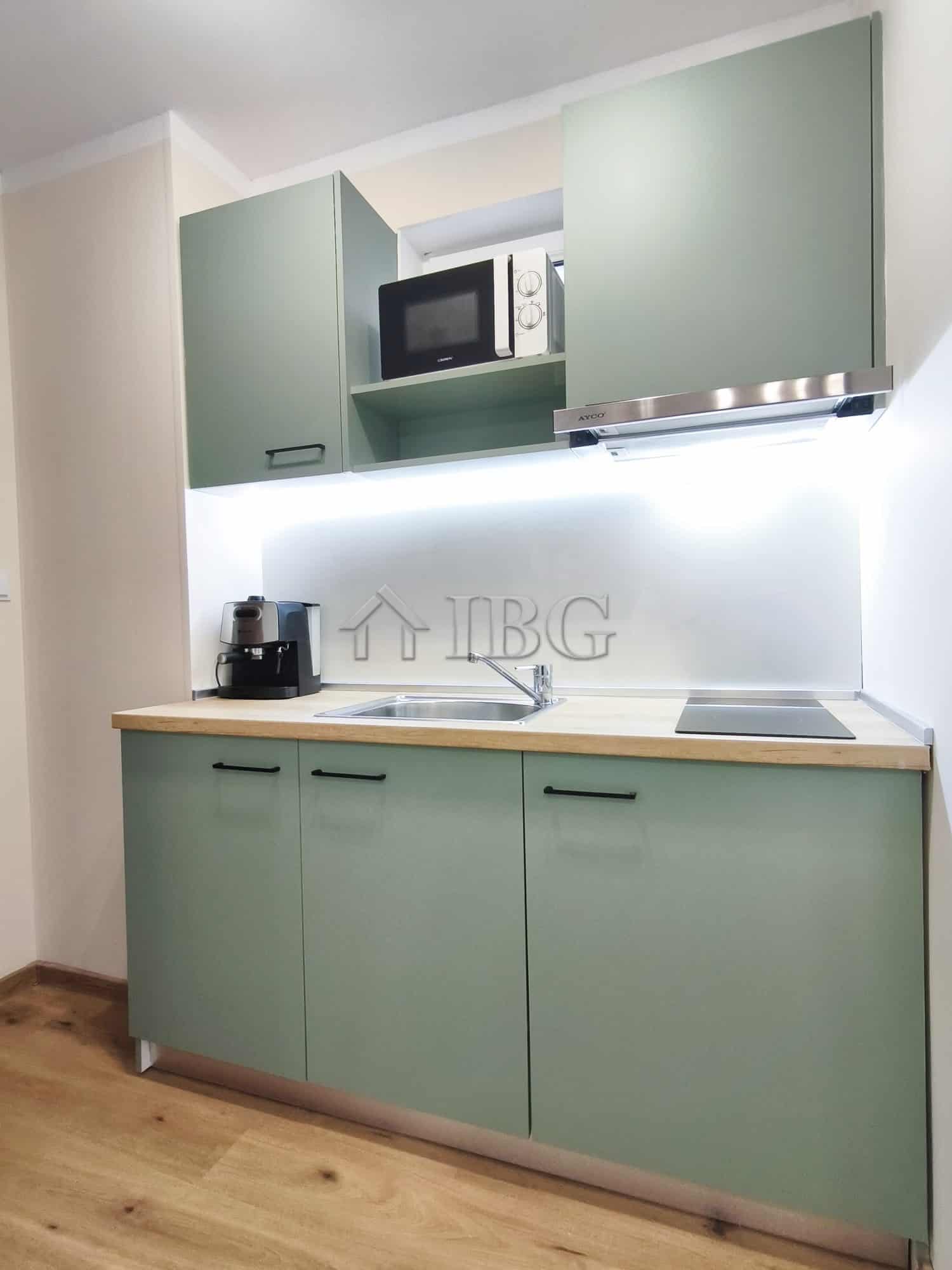 Furnished studio kitchen with sea view, balcony, and modern appliances in Sveti Vlas.