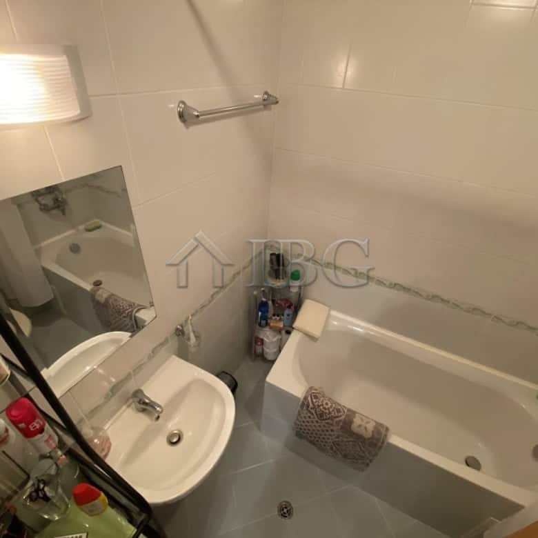 Bright bathroom with bathtub and private yard access in Vineyards Resort, Aheloy.