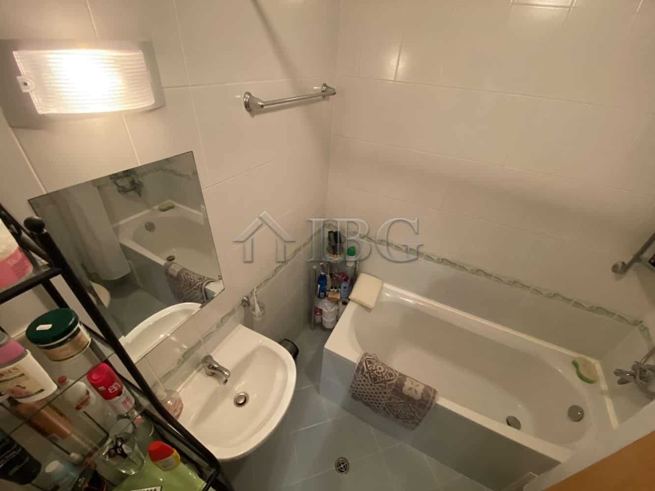 Bright bathroom with bathtub and private yard access in Vineyards Resort, Aheloy.