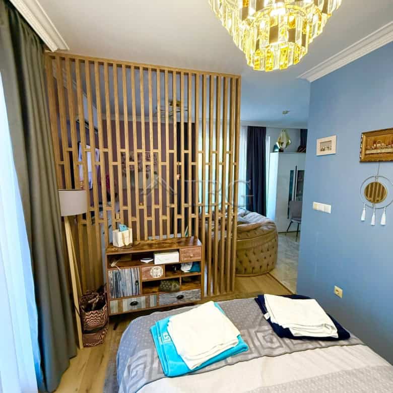 Luxury penthouse bedroom with modern decor and elegant lighting in Sveti Vlas.