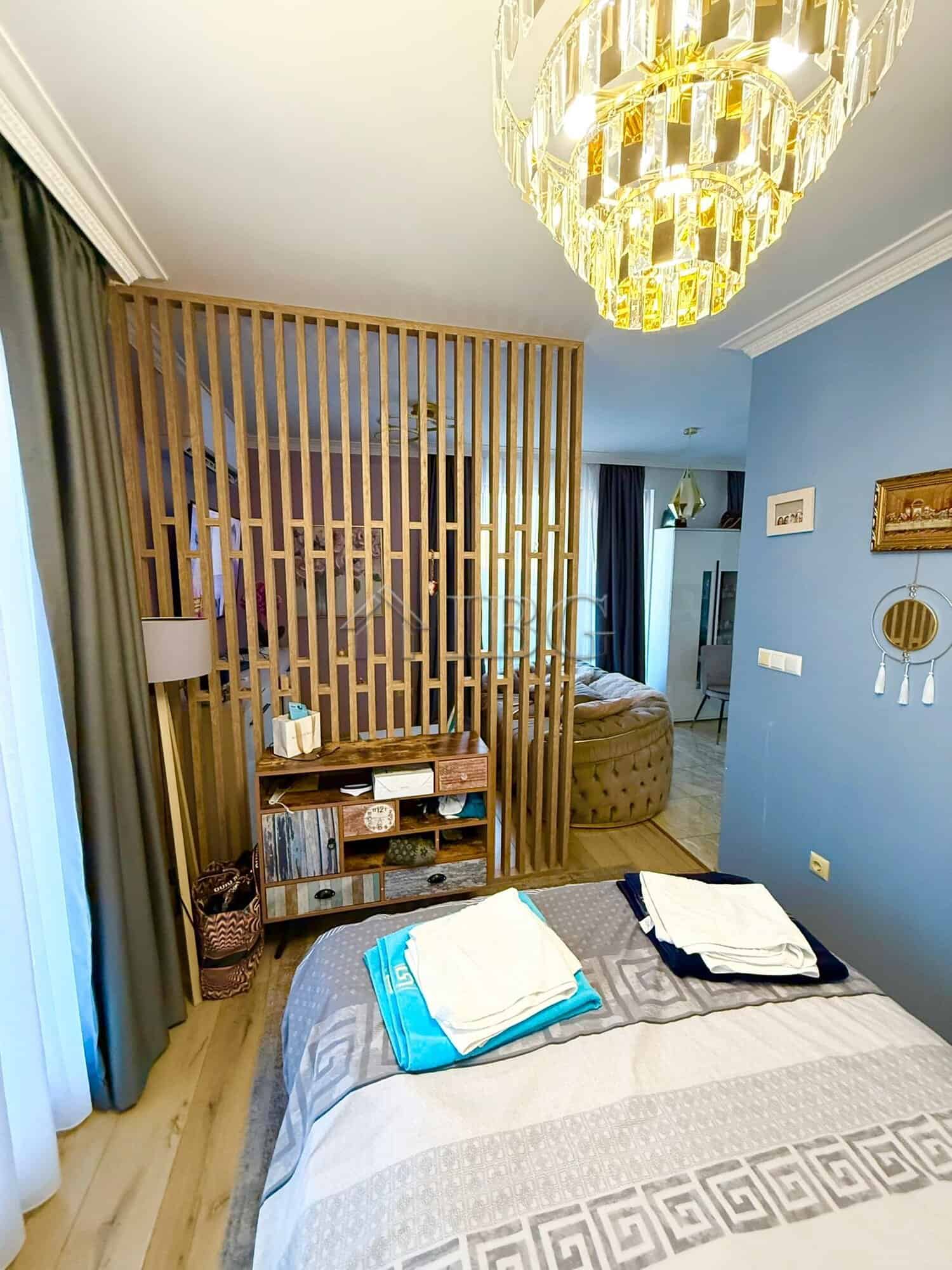 Luxury penthouse bedroom with modern decor and elegant lighting in Sveti Vlas.