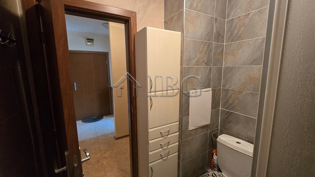 Bright bathroom with modern fixtures in a Sunny Beach two-bedroom apartment.
