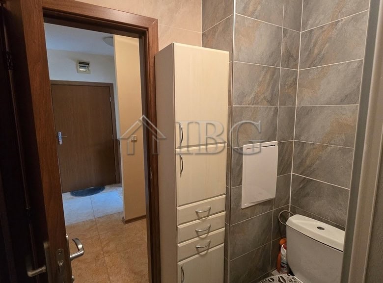 Bright bathroom in a modern 2-bedroom apartment with pool view in Sunny Beach.