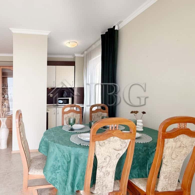 Bright dining area in a 2-bedroom apartment with sea view in Sveti Vlas, Bulgaria.