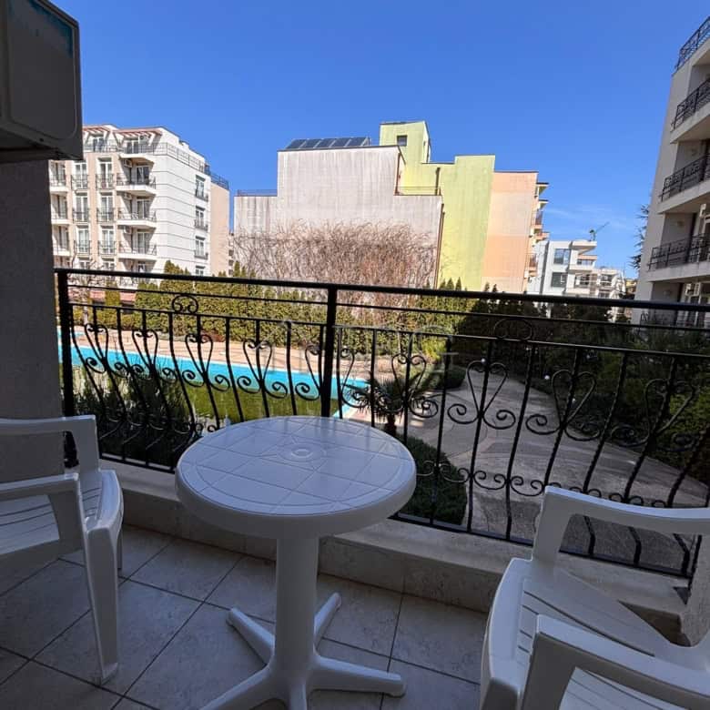 Balcony overlooking the pool and surrounding buildings at Dawn Park, Sunny Beach. Perfect for relaxi.