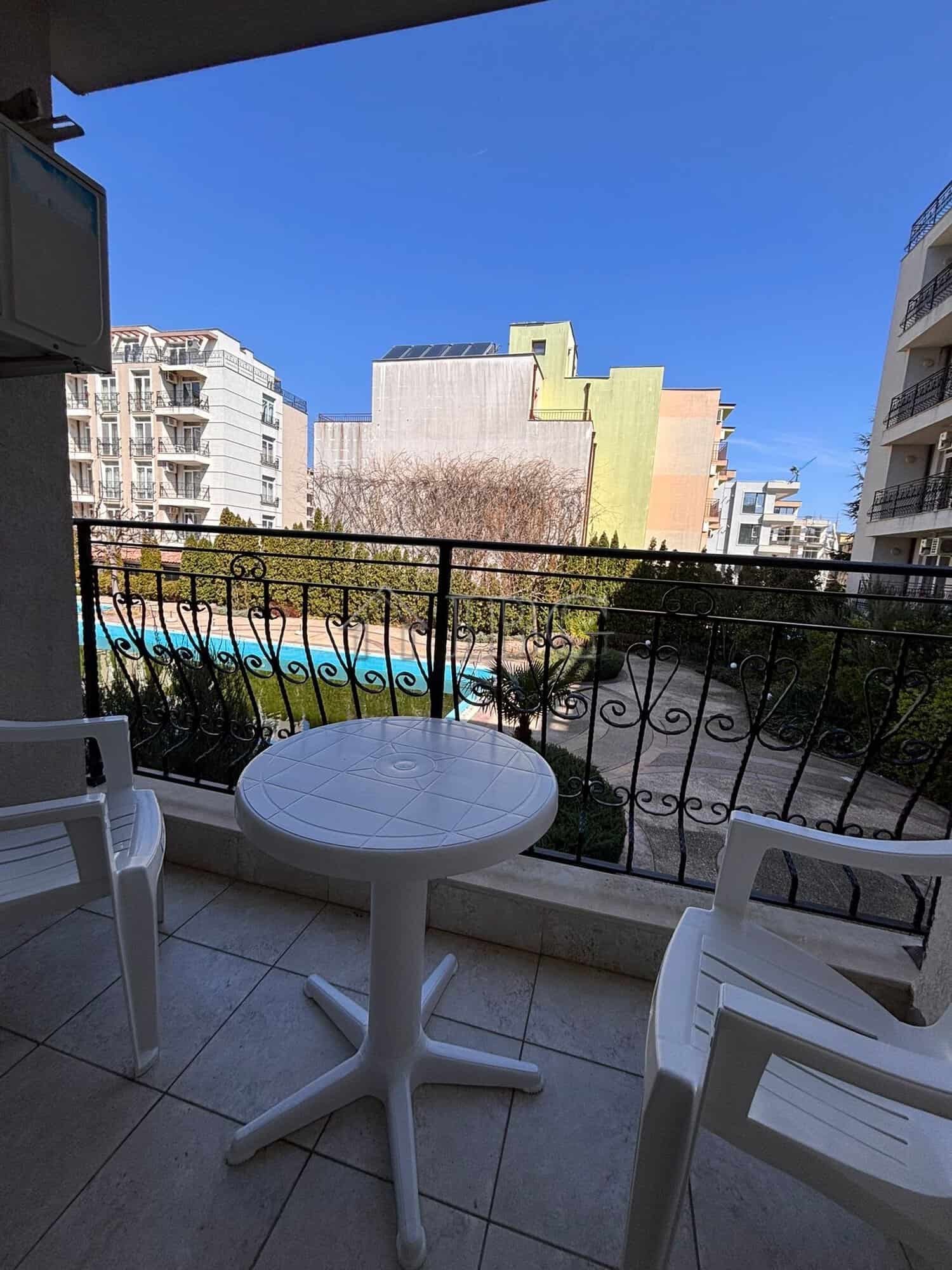 Balcony overlooking the pool and surrounding buildings at Dawn Park, Sunny Beach. Perfect for relaxi.