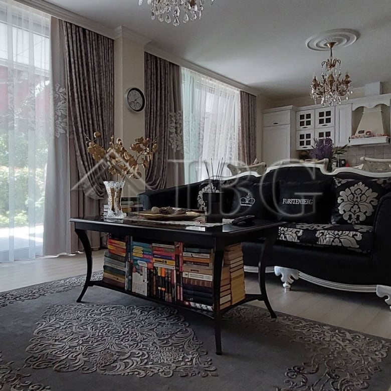 Spacious living room of a luxury two-storey townhouse in Sarafovo, featuring modern decor and large.